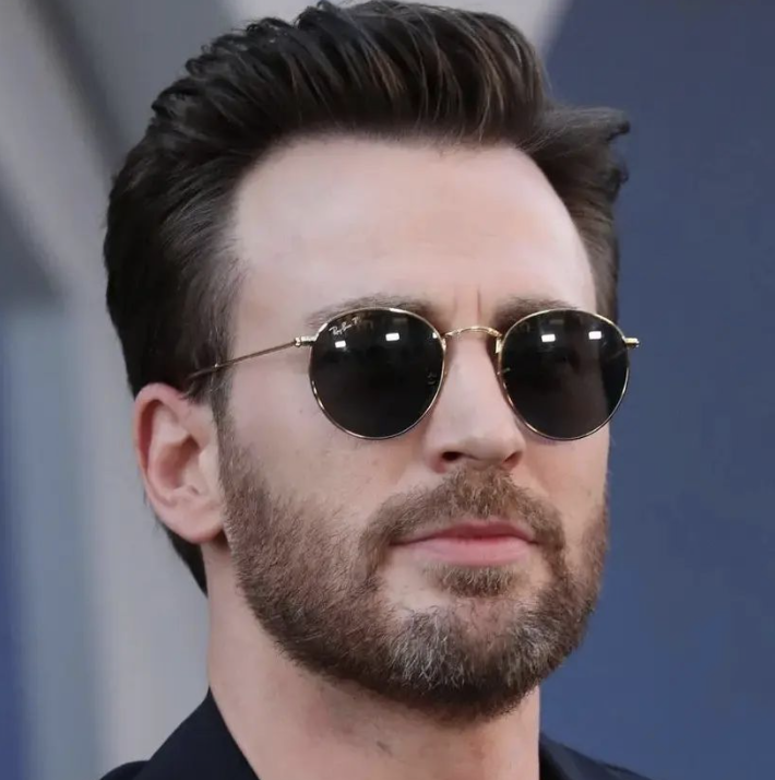 Chris Evans Rockin’ The Ray-Ban Round Style at The Gray Man Premier